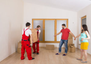 Movers in new house with young family