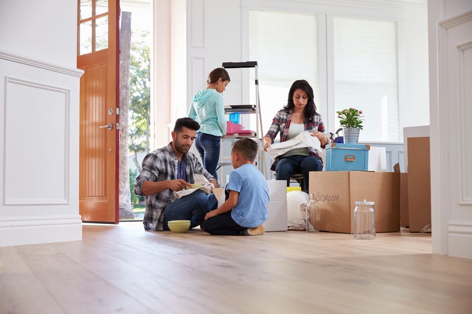 Hispanic Family Moving Into New Home